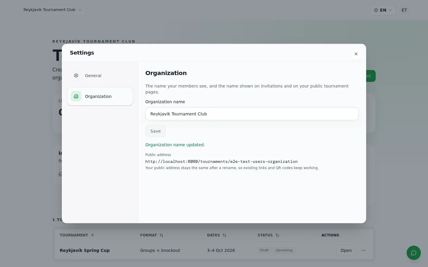Das Organisationseinstellungen-Panel von FairGame mit dem Namensfeld, einer Bestätigung „Organisationsname aktualisiert“ und der darunter unveränderten öffentlichen Adresse